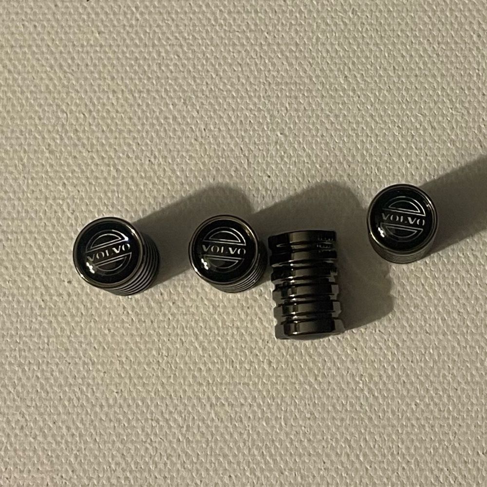 Volvo valve Stem caps in Bronze set of 4 NWT